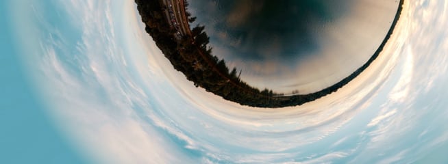 Fisheye image of a body of water and a pier